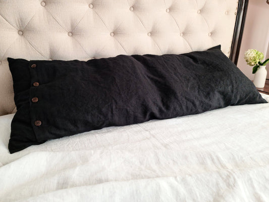Linen body pillow cover in obsidian black color with buttons